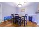 Cozy dining area with wood floors, table with chairs, and stylish decorations at 3774 Hitchcock Way # 836, Myrtle Beach, SC 29572