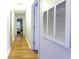 Hallway with hardwood floors that lead to different rooms at 3774 Hitchcock Way # 836, Myrtle Beach, SC 29572