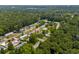 An aerial view of the neighborhood highlighting its quiet, well-treed, location at 3839 Woodridge Circle, Little River, SC 29566