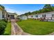 Property features a spacious yard, a deck, and a separate garage, providing ample outdoor space and storage at 3839 Woodridge Circle, Little River, SC 29566