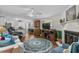 Open concept living room and kitchen area with hardwood floors and plenty of natural light at 3839 Woodridge Circle, Little River, SC 29566