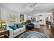Cozy living room with hardwood floors leading to the kitchen at 3839 Woodridge Circle, Little River, SC 29566