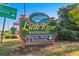Little River Waterfront sign featuring dining, shops and recreational activities at 3839 Woodridge Circle, Little River, SC 29566