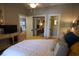 Cozy bedroom with ceiling fan and access to a walk-in closet and bathroom, providing ample space and convenience at 390 Lands End Blvd. # 4-201, Myrtle Beach, SC 29572