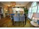 Elegant dining area with stylish lighting, seating for six, and access to the updated kitchen at 390 Lands End Blvd. # 4-201, Myrtle Beach, SC 29572