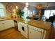 Functional kitchen with granite countertops, modern appliances, and a convenient washer and dryer setup at 390 Lands End Blvd. # 4-201, Myrtle Beach, SC 29572