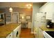 Well-lit kitchen featuring granite countertops, stainless steel appliances, and hardwood floors, perfect for cooking and entertaining at 390 Lands End Blvd. # 4-201, Myrtle Beach, SC 29572