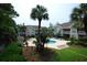 Community pool and surrounding lounge area offer residents a relaxing space at 390 Lands End Blvd. # 4-201, Myrtle Beach, SC 29572