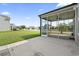 Outdoor view of a screened patio and backyard space at 4115 Alvina Way, Myrtle Beach, SC 29579