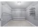 Walk-in closet with an overhead light, multiple shelving and storage options at 4115 Alvina Way, Myrtle Beach, SC 29579