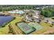Aerial view of tennis and basketball courts, showcasing the community's recreational amenities at 4115 Alvina Way, Myrtle Beach, SC 29579