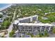 A captivating aerial perspective shows this condo's ideal location amidst lush greenery and convenient parking at 423 Parker Dr. # 334, Pawleys Island, SC 29585