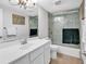 Bathroom featuring a white vanity, toilet, and a shower with glass doors at 423 Parker Dr. # 334, Pawleys Island, SC 29585