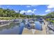 Scenic marina with boats docked and lush greenery in the background at 423 Parker Dr. # 334, Pawleys Island, SC 29585