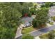 An aerial view highlighting the home's location within the neighborhood near the golf course and water feature at 4314 Turtle Ln., Little River, SC 29566