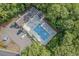 Aerial view of the community pool featuring ample lounge seating and a parking area at 4314 Turtle Ln., Little River, SC 29566