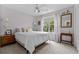 Cozy bedroom featuring soft natural light, neutral decor and carpet flooring at 4314 Turtle Ln., Little River, SC 29566