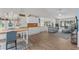 Open-concept living space features dining area, kitchen with breakfast bar, and comfortable seating in the living room at 4314 Turtle Ln., Little River, SC 29566