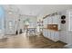 Open-concept living space features a dining area, kitchen with breakfast bar, and comfortable seating in the living room at 4314 Turtle Ln., Little River, SC 29566