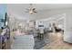 Spacious open-concept living area with living room, dining space, and kitchen, ideal for modern living and entertaining at 4314 Turtle Ln., Little River, SC 29566
