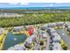 Overhead shot of condo community featuring a pond, fountain, and convenient parking at 4820 Magnolia Lake Dr. # 305, Myrtle Beach, SC 29577