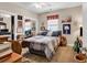 Inviting bedroom features a comfortable bed, bright natural light and relaxing decor at 4820 Magnolia Lake Dr. # 305, Myrtle Beach, SC 29577