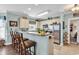 Well-lit kitchen featuring stainless steel appliances, breakfast bar, and modern finishes at 4820 Magnolia Lake Dr. # 305, Myrtle Beach, SC 29577