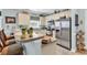 Charming kitchen featuring stainless steel appliances, breakfast bar, and ample cabinet space at 4820 Magnolia Lake Dr. # 305, Myrtle Beach, SC 29577