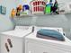 Laundry room with modern washer and dryer for convenient home-cleaning at 4820 Magnolia Lake Dr. # 305, Myrtle Beach, SC 29577