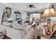 Comfortable living room with large windows, cozy furniture, and stylish decor at 4820 Magnolia Lake Dr. # 305, Myrtle Beach, SC 29577