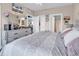 Well-lit main bedroom featuring a dresser, ensuite, and ample closet space at 4820 Magnolia Lake Dr. # 305, Myrtle Beach, SC 29577