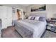 Calm main bedroom with a large bed, ensuite bathroom, and soothing decor at 4820 Magnolia Lake Dr. # 305, Myrtle Beach, SC 29577