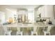 Open kitchen with a granite countertop island, stainless steel appliances, and ample cabinet space at 5034 Selene Ct., Myrtle Beach, SC 29588