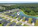 Aerial view of the community, showcasing home's location near the pond and green spaces at 519 Royal Jay Ln., Longs, SC 29568