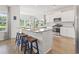 Bright and airy kitchen with a granite island, stainless steel appliances, and an open layout at 519 Royal Jay Ln., Longs, SC 29568