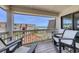Relaxing balcony with comfortable seating offering views of the pool, nearby buildings, and ocean at 5601 N Ocean Blvd. # A-307, Myrtle Beach, SC 29577