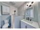 Renovated bathroom features a vanity with a black faucet and a beautifully tiled shower at 5601 N Ocean Blvd. # A-307, Myrtle Beach, SC 29577
