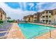 Inviting pool area with plenty of lounge chairs for relaxation at 5601 N Ocean Blvd. # A-307, Myrtle Beach, SC 29577