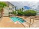 Inviting hot tub surrounded by lush landscaping, providing a private and relaxing retreat next to the building at 5601 N Ocean Blvd. # A-307, Myrtle Beach, SC 29577