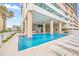 Beautiful outdoor pool area with plenty of lounge chairs and a view of the ocean at 5700 N Ocean Blvd. # Ph12, North Myrtle Beach, SC 29582