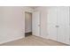 Spacious bedroom with neutral carpet, a doorway, a closet and fresh paint at 575 Strawberry Field Way, Galivants Ferry, SC 29544