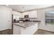 Modern kitchen with stainless steel appliances, granite countertops, and ample cabinet space at 575 Strawberry Field Way, Galivants Ferry, SC 29544