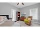 Bedroom featuring soft natural light, neutral decor, and reading nook at 601 46Th Ave. S, North Myrtle Beach, SC 29582