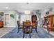 Inviting dining area with a round table, classic chandelier, and serene grey walls at 601 46Th Ave. S, North Myrtle Beach, SC 29582
