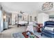 Stylishly furnished main bedroom with a four-poster bed, sitting area, and generous closet space at 601 46Th Ave. S, North Myrtle Beach, SC 29582