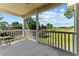 Relaxing balcony with scenic golf course view, chair, and peaceful ambiance at 6010 Windsor Green Way # 301, Myrtle Beach, SC 29579