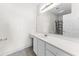 Bathroom features a large mirror, expansive vanity, and neutral color scheme at 6010 Windsor Green Way # 301, Myrtle Beach, SC 29579