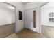 Well-lit entryway with a tiled floor and visible doorways to other rooms, offering a welcoming entrance at 6010 Windsor Green Way # 301, Myrtle Beach, SC 29579
