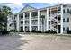 Beautiful exterior view of the building with a parking lot at 6010 Windsor Green Way # 301, Myrtle Beach, SC 29579