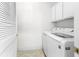 Convenient laundry room with modern washer and dryer units and built-in storage at 6010 Windsor Green Way # 301, Myrtle Beach, SC 29579